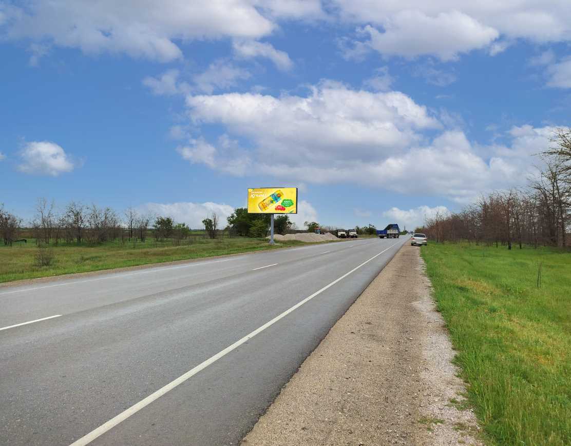 Фотография рекламного носителя, тип: Билборд 3x6, адрес: Кировское - Первомайское 9 453м, перед поворотом на Новопокровку, Кировское, Донецкая область, Россия. Сторона B №1377032