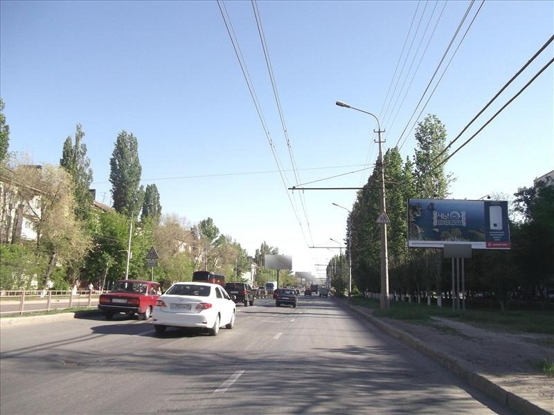 Фотография рекламного носителя, тип: Билборд 3x6, адрес: 2-я Продольная ул., д.65, Волгоград, Волгоградская область, Россия. Сторона А №111341