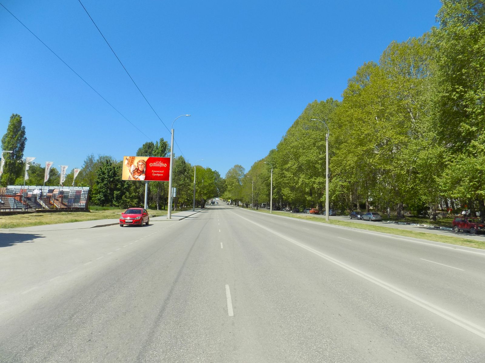 Фотография рекламного носителя, тип: Билборд 3x6, адрес: Героев Сталинграда ул., д.8б, Симферополь, Республика Крым, Россия. Сторона B №797294