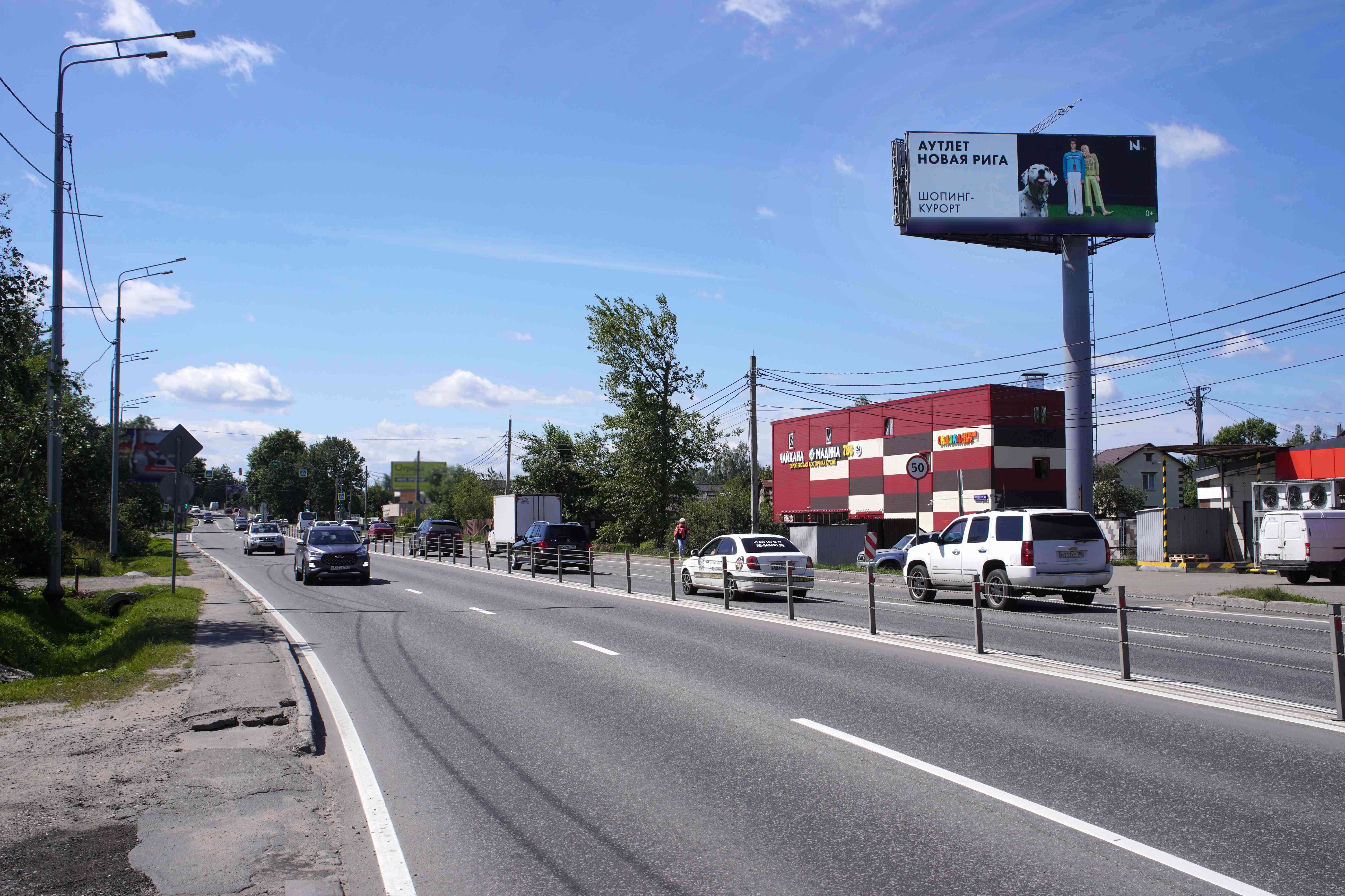 Фотография рекламного носителя, тип: Суперсайт 4x12, адрес: Волоколамское ш., 27 600м от Москвы, Красногорск, Московская область, Россия. Сторона А1 №1077411