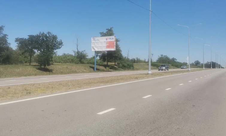 Фотография рекламного носителя, тип: Билборд 3x6, адрес: Донецк-Мариуполь а/д, 4 000м от Сталевара, Мариуполь, Донецкая область, Россия. Сторона Б №1327300