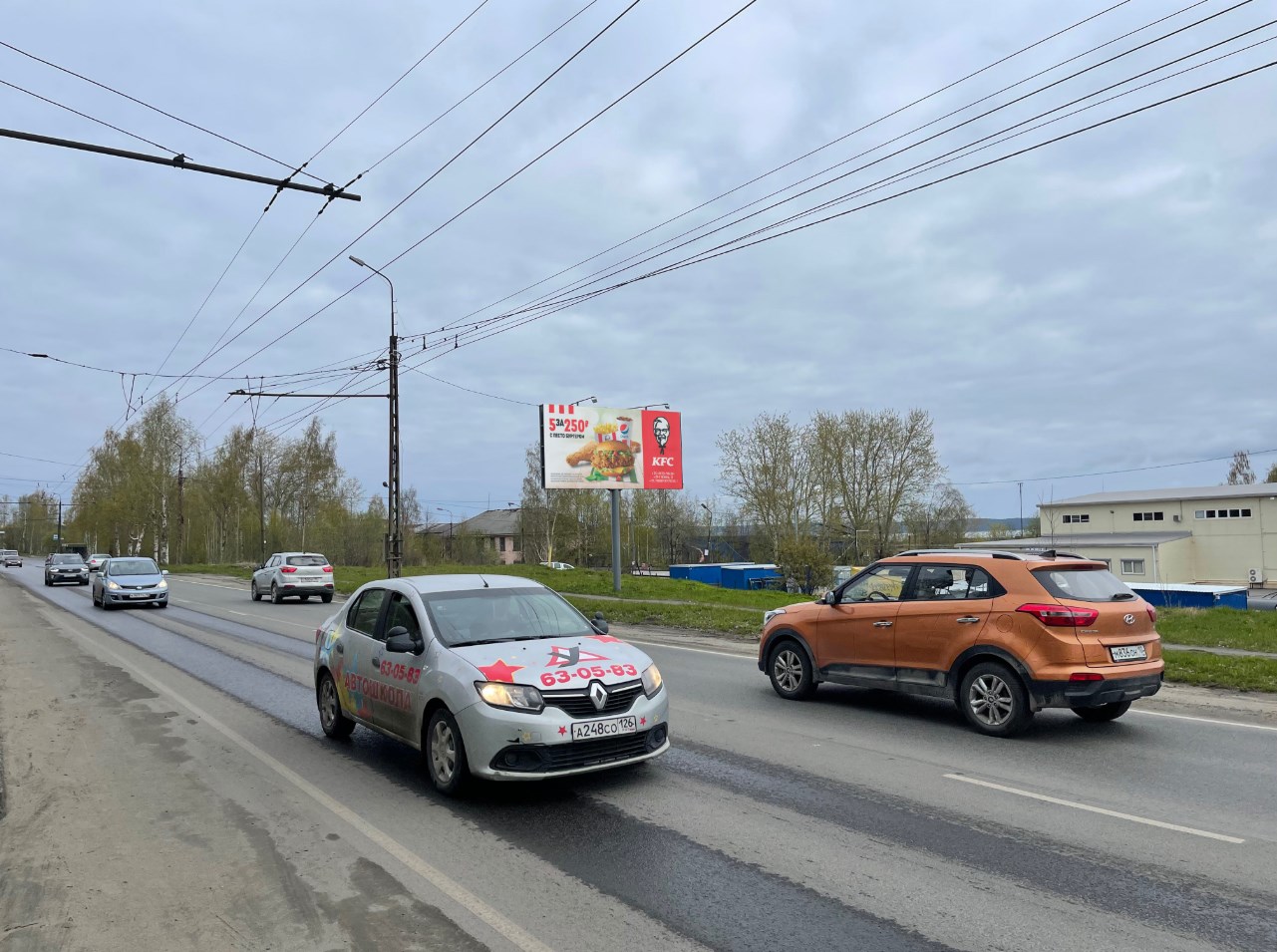 Фотография рекламного носителя, тип: Билборд 3x6, адрес: Онежской Флотилии ул., д.34, стр.3, Петрозаводск, Республика Карелия, Россия. Сторона A №848636