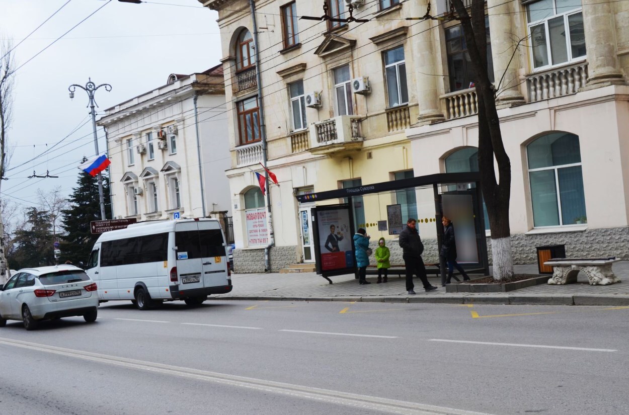 Фотография рекламного носителя, тип: Остановка 1.8x1.2, адрес: Ленина ул., ост. Площадь Суворова, Севастополь, Россия. Сторона A1-А5 №721553