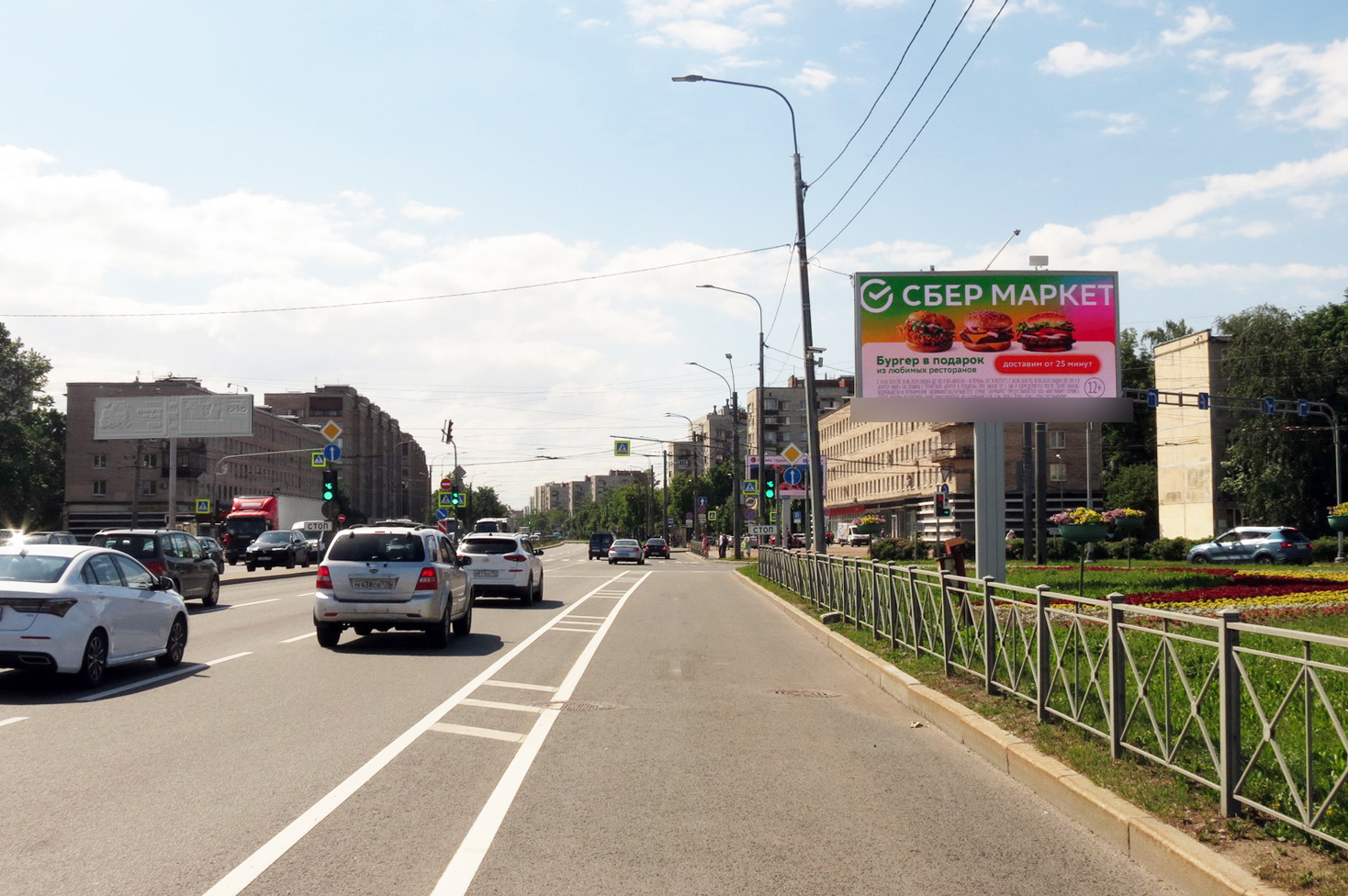 Фотография рекламного носителя, тип: Билборд 3x6, адрес: Народная ул. X Большевиков пр-т. X Мурманское ш., Санкт-Петербург, Россия. Сторона А1 №105990
