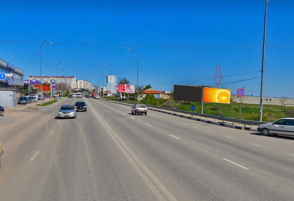 Фотография рекламного носителя, тип: Билборд 3x6, адрес: Балаклавское ш., поз.1, Севастополь, Россия. Сторона A2 №1005541