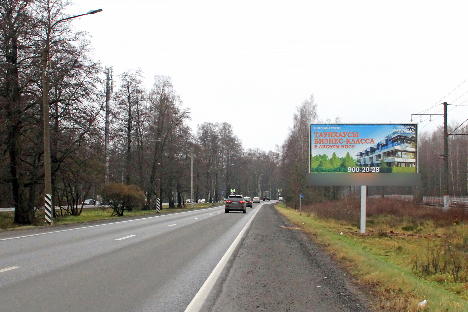 Фотография рекламного носителя, тип: Билборд 3x6, адрес: Приморское ш., 160м до ж-д ст. Морская, Санкт-Петербург, Россия. Сторона А №687330