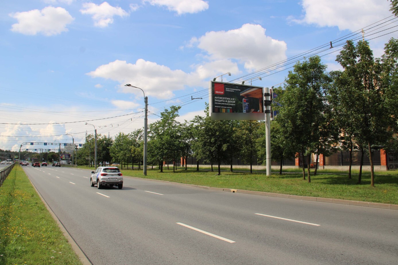 Фотография рекламного носителя, тип: Билборд 3x6, адрес: Косыгина пр-т. Х Передовиков пр-т., Санкт-Петербург, Россия. Сторона А1 №106765