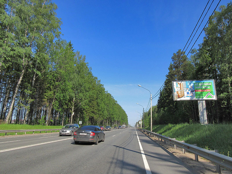 Фотография рекламного носителя, тип: Билборд 3x6, адрес: Выборгское ш., 25 400м, Сертолово, Ленинградская область, Россия. Сторона A №170565