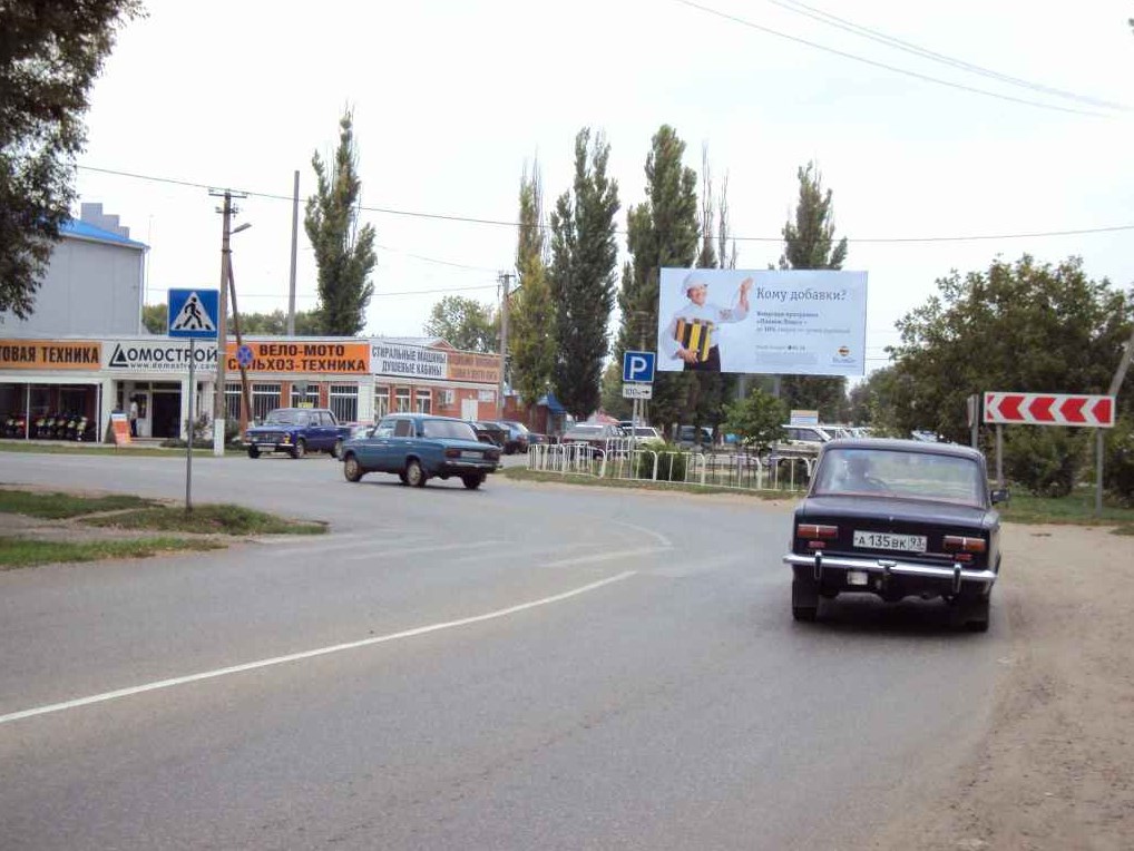 Фотография рекламного носителя, тип: Билборд 3x6, адрес: Староминская ст., Петренко ул., клумба, Краснодарский край, Россия. Сторона А №1337660