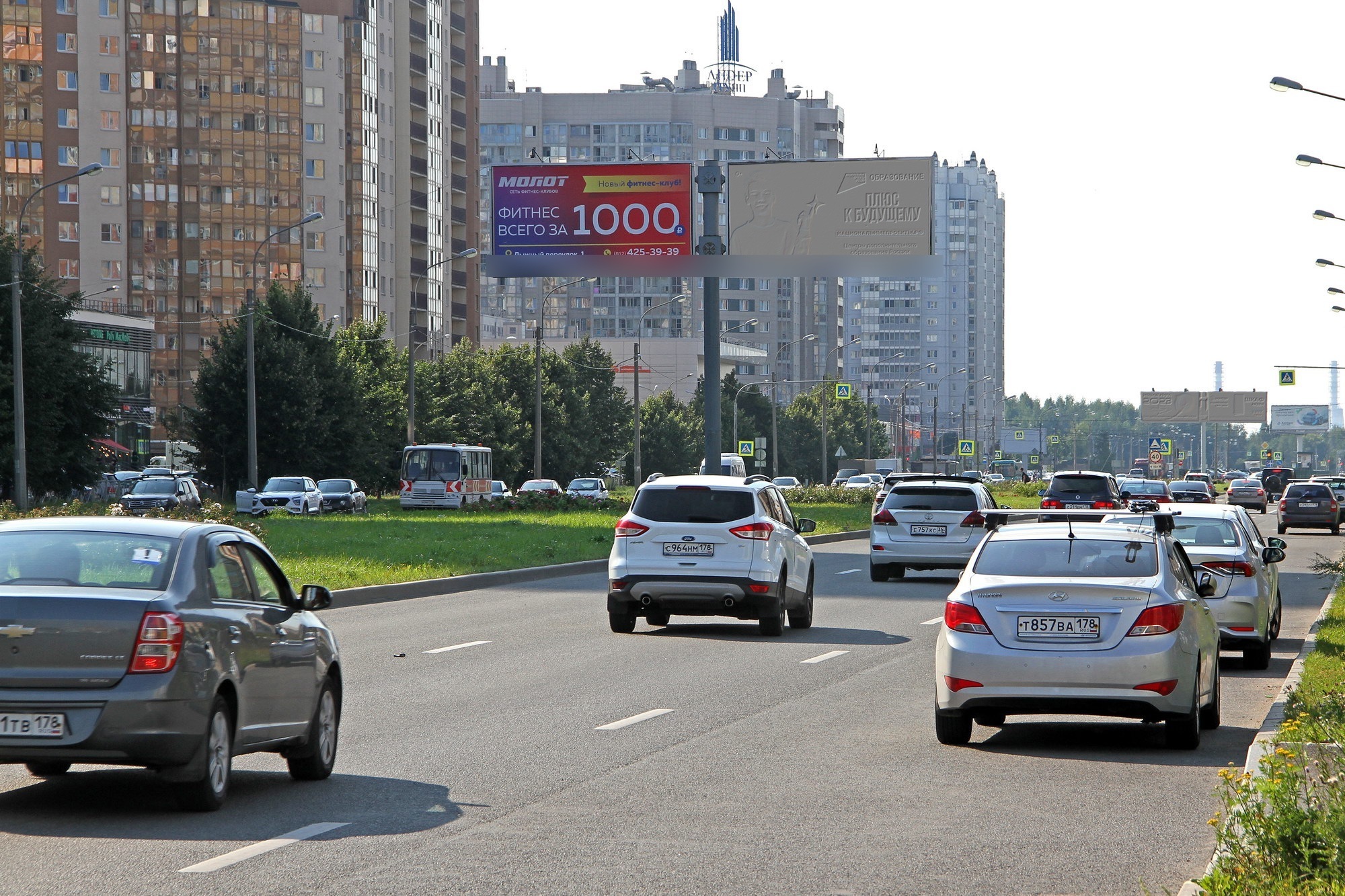 Фотография рекламного носителя, тип: Билборд 3x6, адрес: Оптиков ул., д.32, Санкт-Петербург, Россия. Сторона А3 №207893