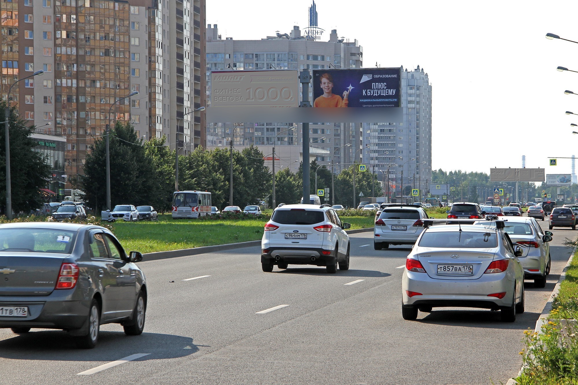 Фотография рекламного носителя, тип: Билборд 3x6, адрес: Оптиков ул., д.32, Санкт-Петербург, Россия. Сторона А4 №207894