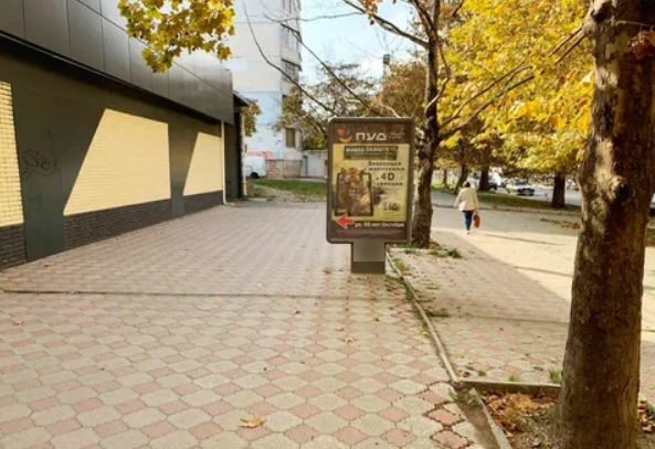 Фотография рекламного носителя, тип: Ситиформат 1.8x1.2, адрес: 60 лет Октября ул., д.18а, поз.1, Симферополь, Республика Крым, Россия. Сторона Б №797768