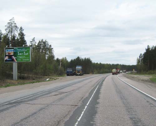 Фотография рекламного носителя, тип: Билборд 3x6, адрес: Трасса СКАНДИНАВИЯ, 81 200м, Санкт-Петербург, Россия. Сторона Б №131603