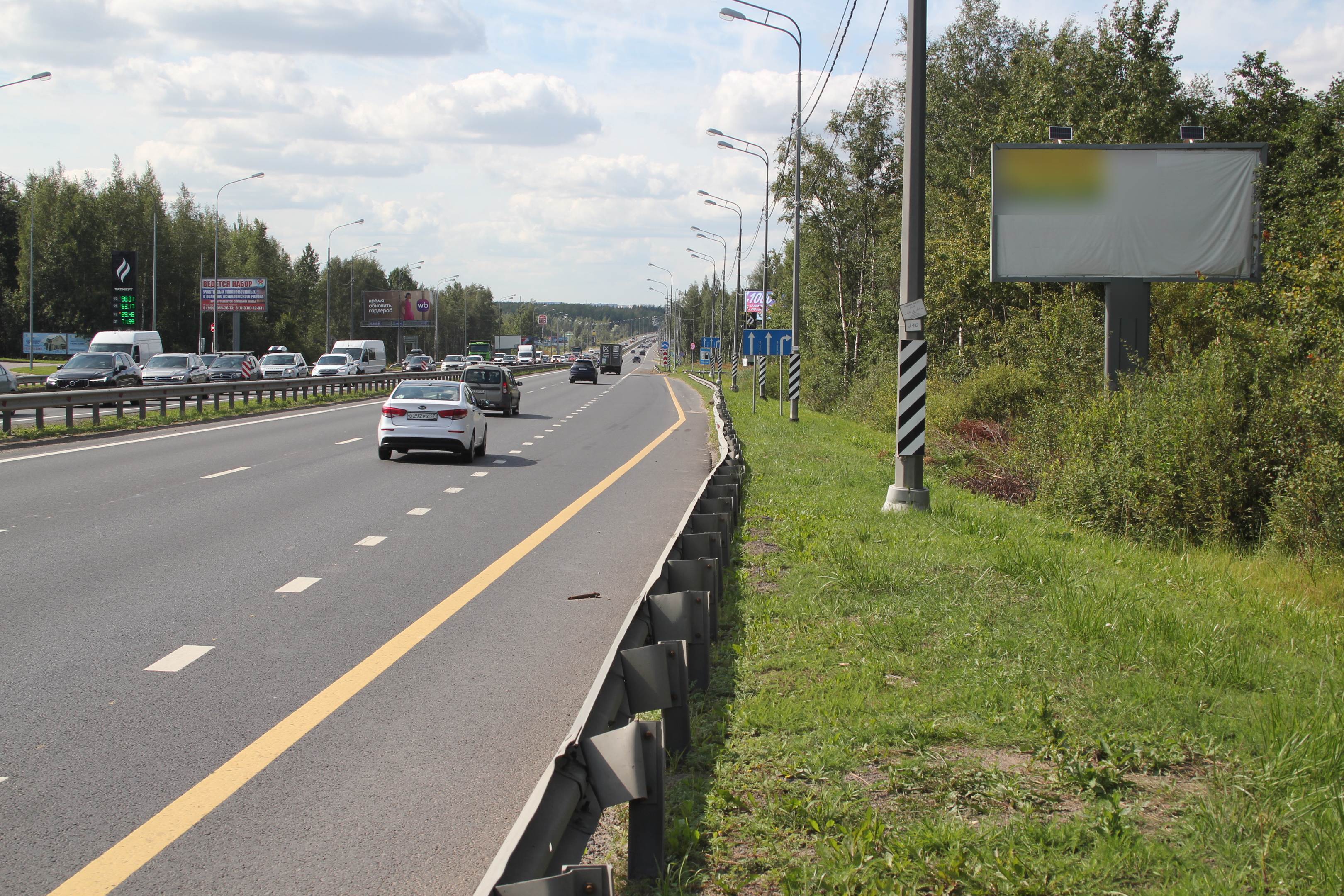 Фотография рекламного носителя, тип: Билборд 3x6, адрес: Мурманское ш., 21 325м, Санкт-Петербург, Россия. Сторона А №166379