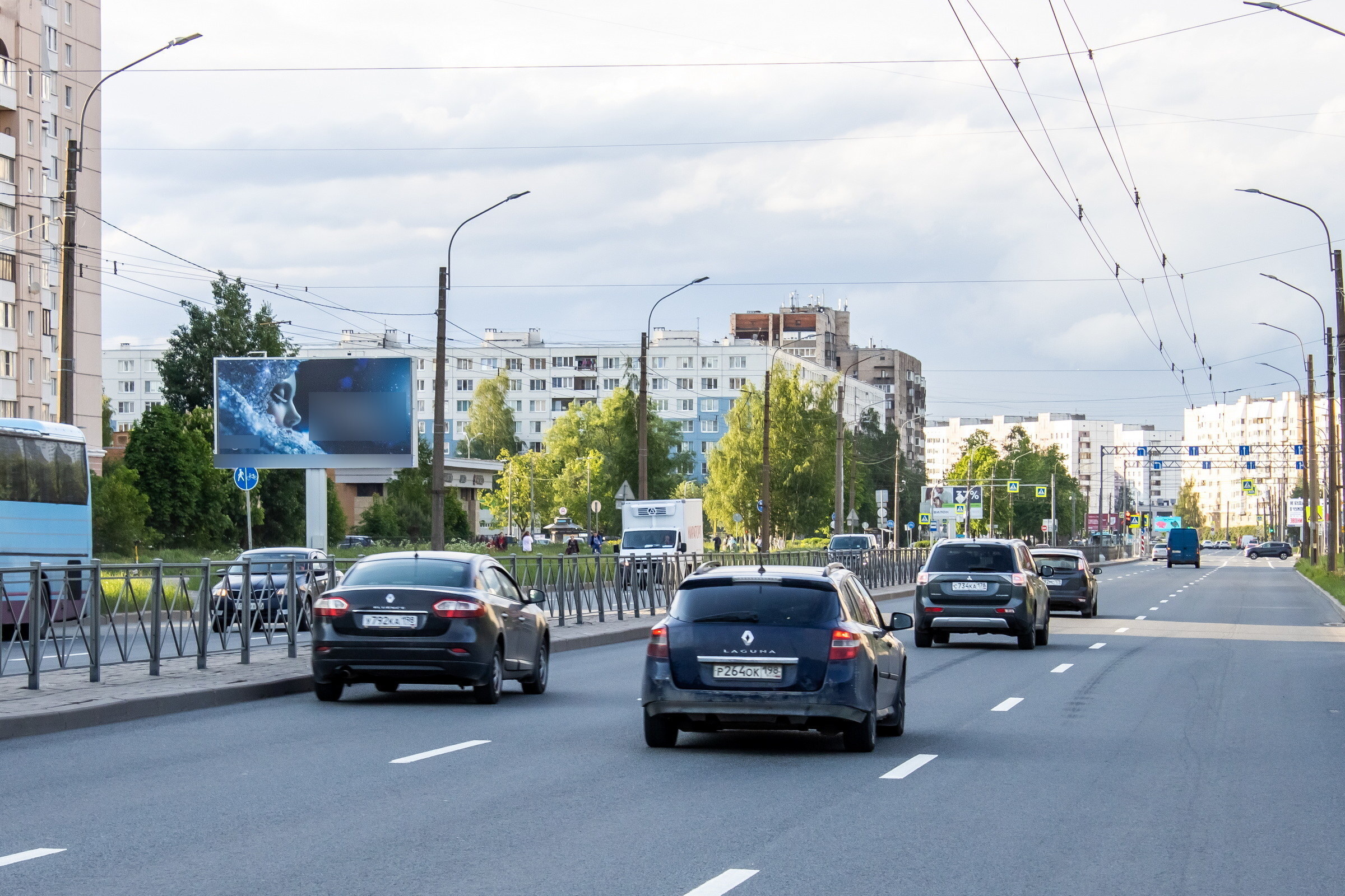 Фотография рекламного носителя, тип: Билборд 3x6, адрес: Большевиков пр-т., д.45 Х Тельмана ул., Санкт-Петербург, Россия. Сторона Б №106273