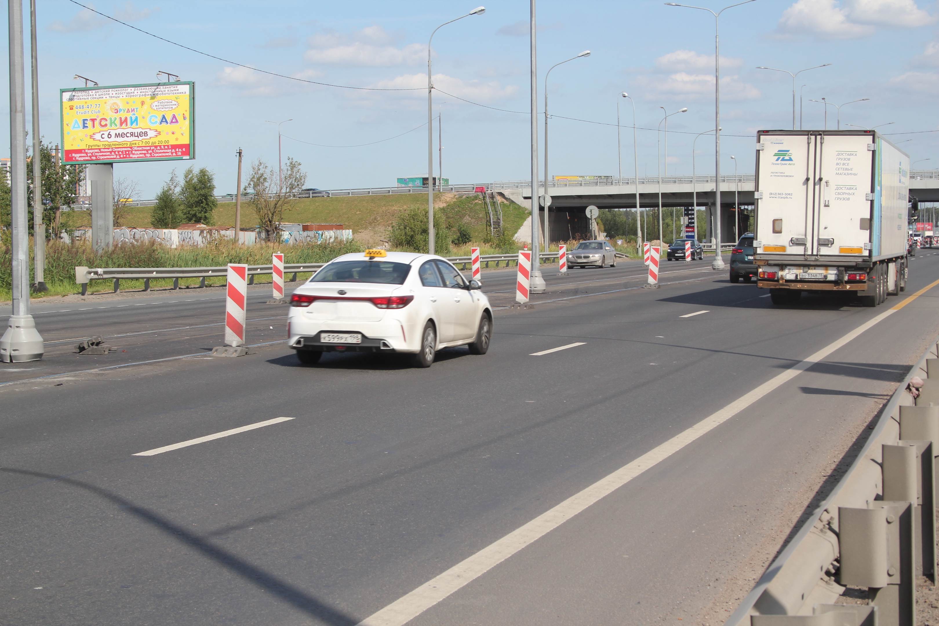 Фотография рекламного носителя, тип: Билборд 3x6, адрес: Мурманское ш., 12 400м, Санкт-Петербург, Россия. Сторона Б №166348
