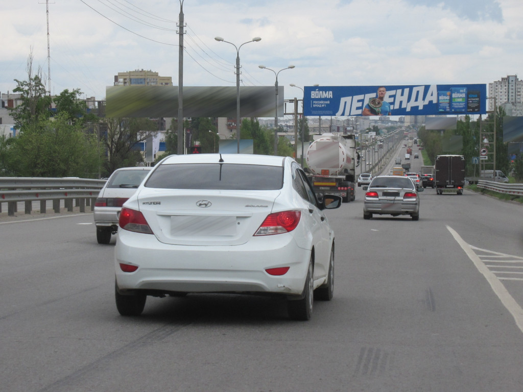 Фотография рекламного носителя, тип: Арка, адрес: 3-я продольная магистраль ул. Х 30-летия Победы б-р., Волгоград, Волгоградская область, Россия. Сторона А4 №111579
