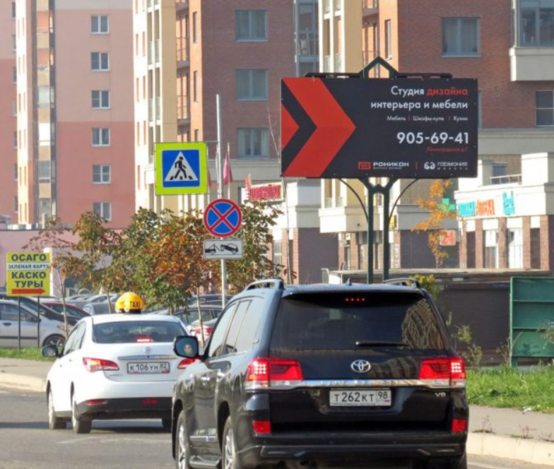 Фотография рекламного носителя, тип: Нестандартный билборд, адрес: Ленинградская ул., д.7 корп.3, Кудрово, Ленинградская область, Россия. Сторона А №1348707