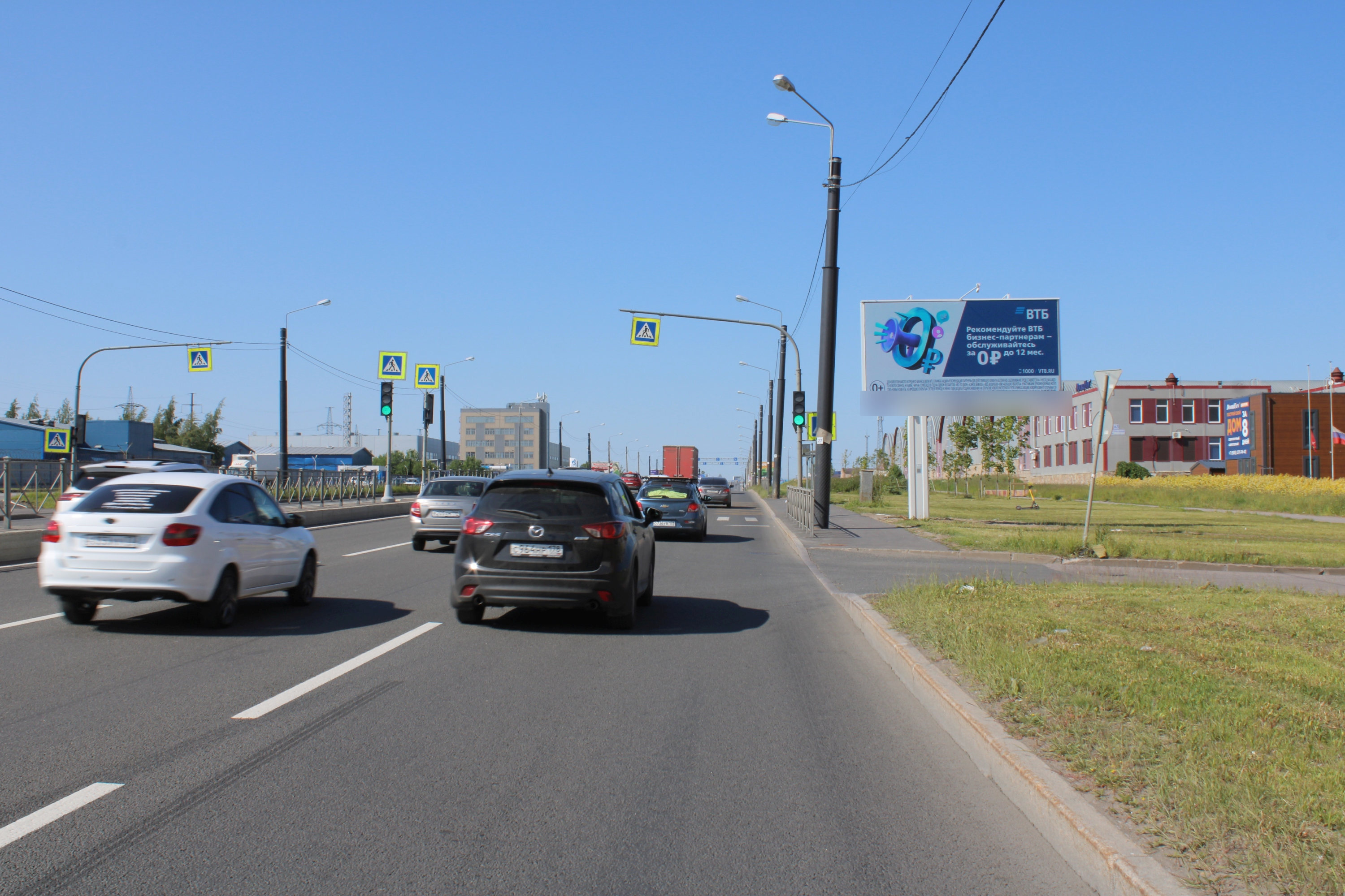 Фотография рекламного носителя, тип: Билборд 3x6, адрес: Индустриальный пр-т., д.86 Х Электропультовцев ул., Санкт-Петербург, Россия. Сторона А1 №119098