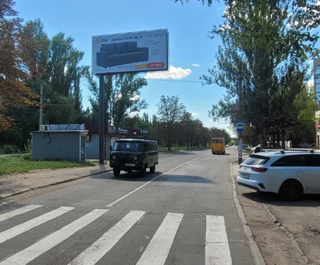 Фотография рекламного носителя, тип: Билборд 3x6, адрес: Раздольная ул., д.12а, Донецк, Донецкая область, Россия. Сторона Б №1327631