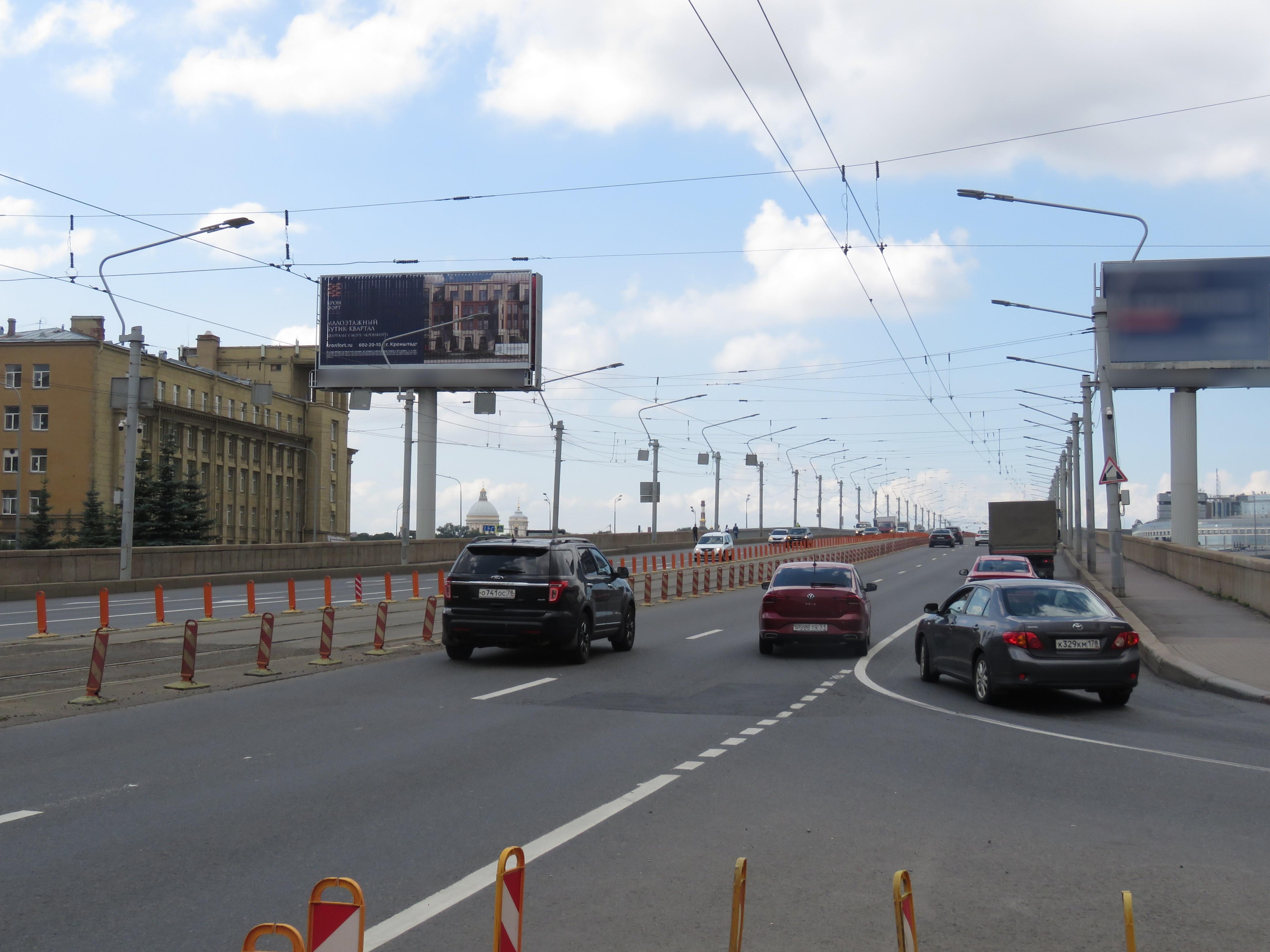 Фотография рекламного носителя, тип: Суперсайт 5x12, адрес: Заневский пр.-т., у моста Александра Невского, Санкт-Петербург, Россия. Сторона Б1-Б3 №1079734