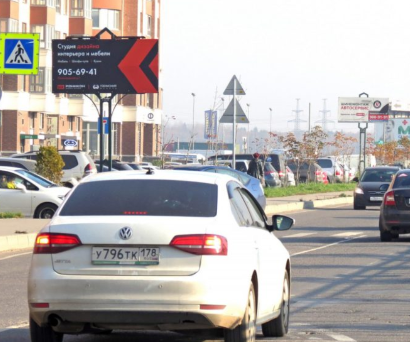 Фотография рекламного носителя, тип: Нестандартный билборд, адрес: Ленинградская ул., д.7 корп.3, Кудрово, Ленинградская область, Россия. Сторона В №1348708