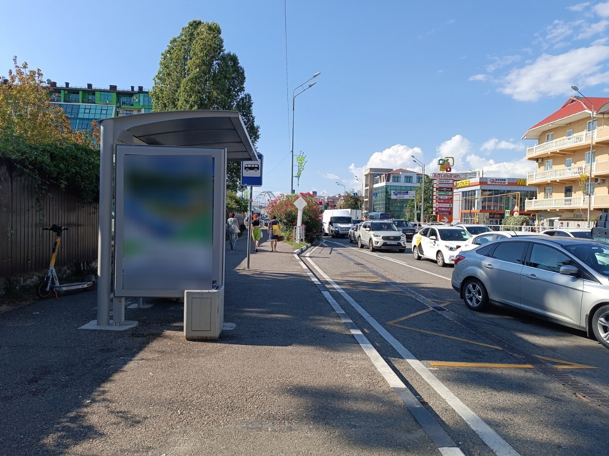 Фотография рекламного носителя, тип: Остановка 1.8x1.2, адрес: Ленина ул., остановка сан.Адлер, поз.1, Адлер, Краснодарский край, Россия. Сторона Б №1335490