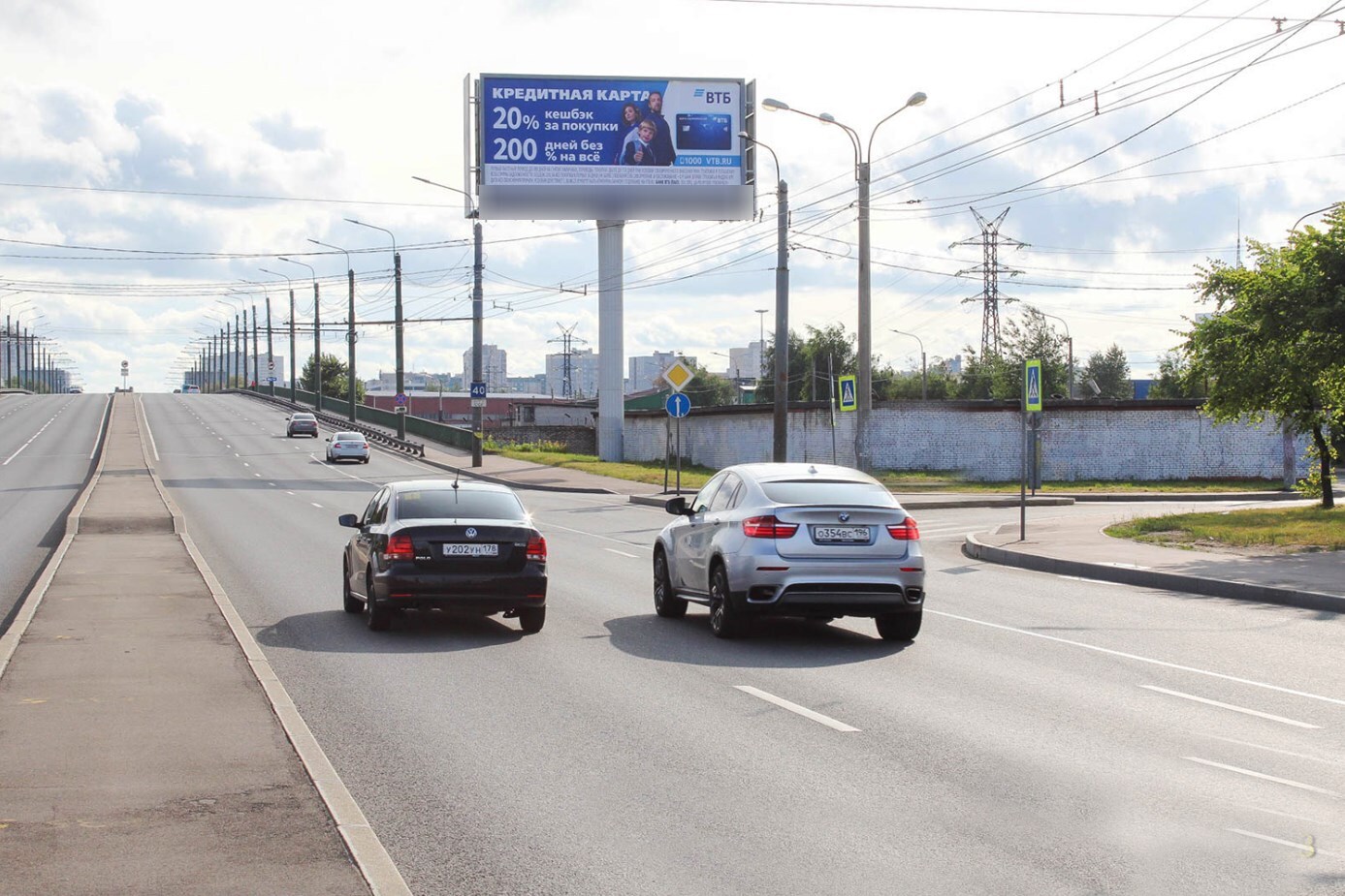 Фотография рекламного носителя, тип: Суперсайт 5x12, адрес: Маршала Жукова пр-т., д.13, Санкт-Петербург, Россия. Сторона А №126927