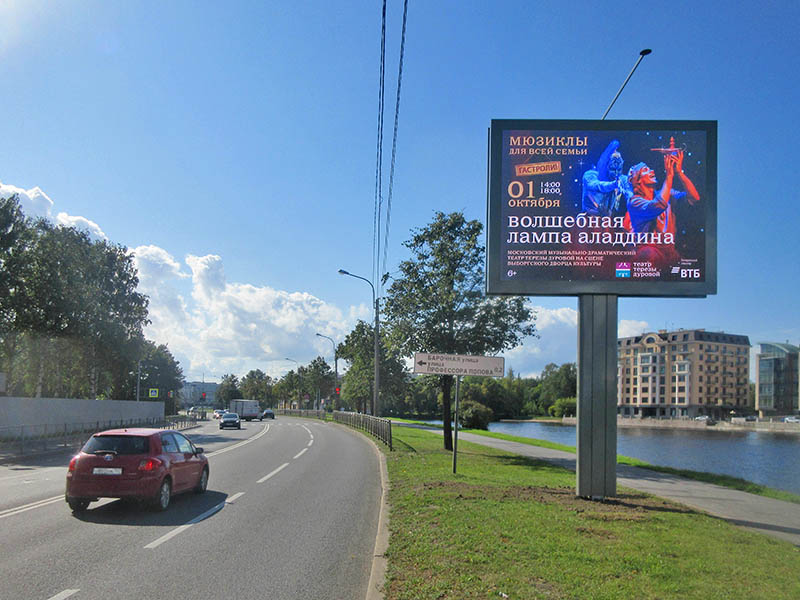 Фотография рекламного носителя, тип: Ситиборд 2.7x3.7, адрес: Песочная наб., поз.1, Санкт-Петербург, Россия. Сторона A1-A10 №165531