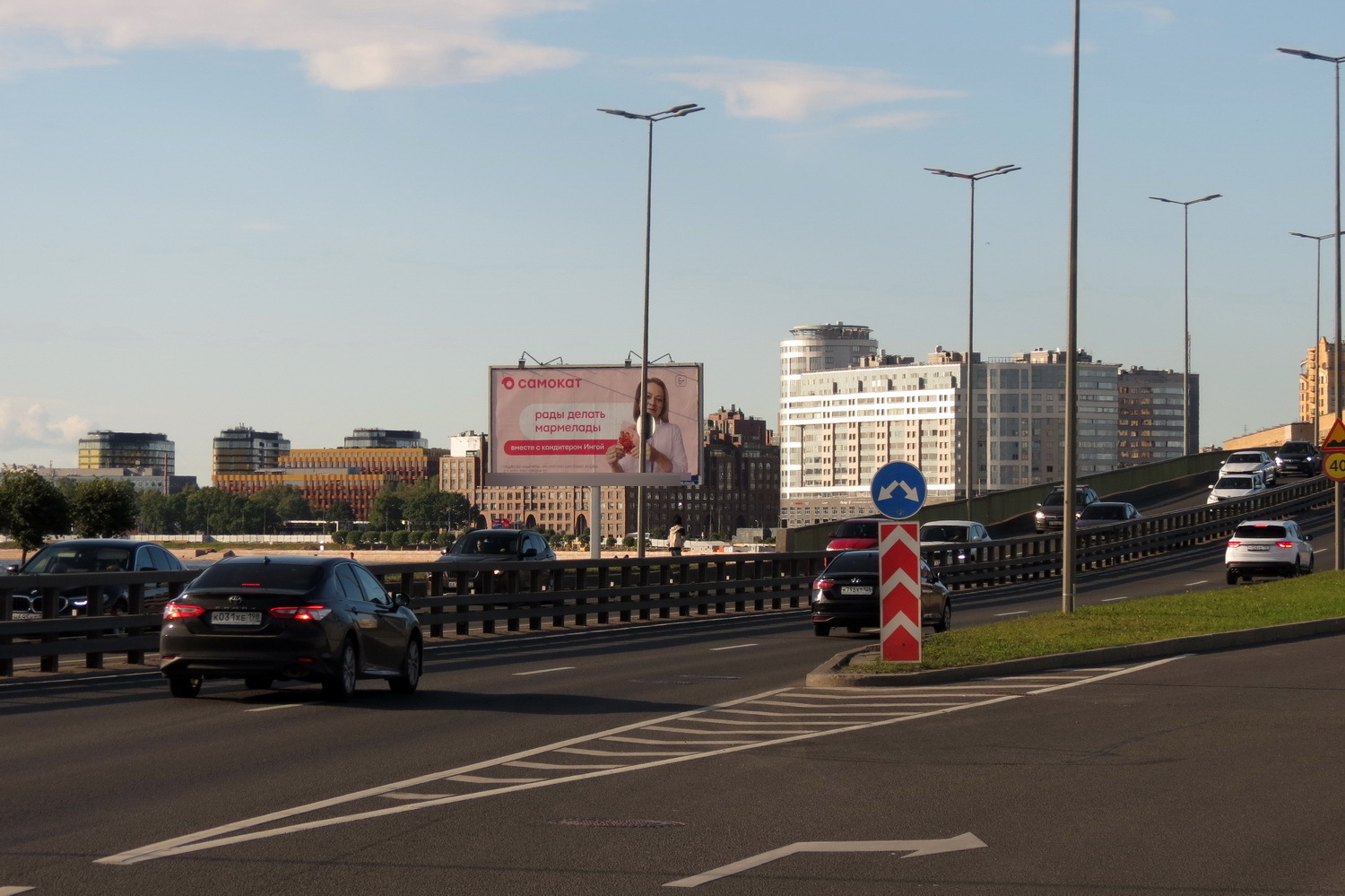 Фотография рекламного носителя, тип: Билборд 3x6, адрес: Малоохтинская наб., съезд с Малоохтинского моста, Санкт-Петербург, Россия. Сторона Б №120868