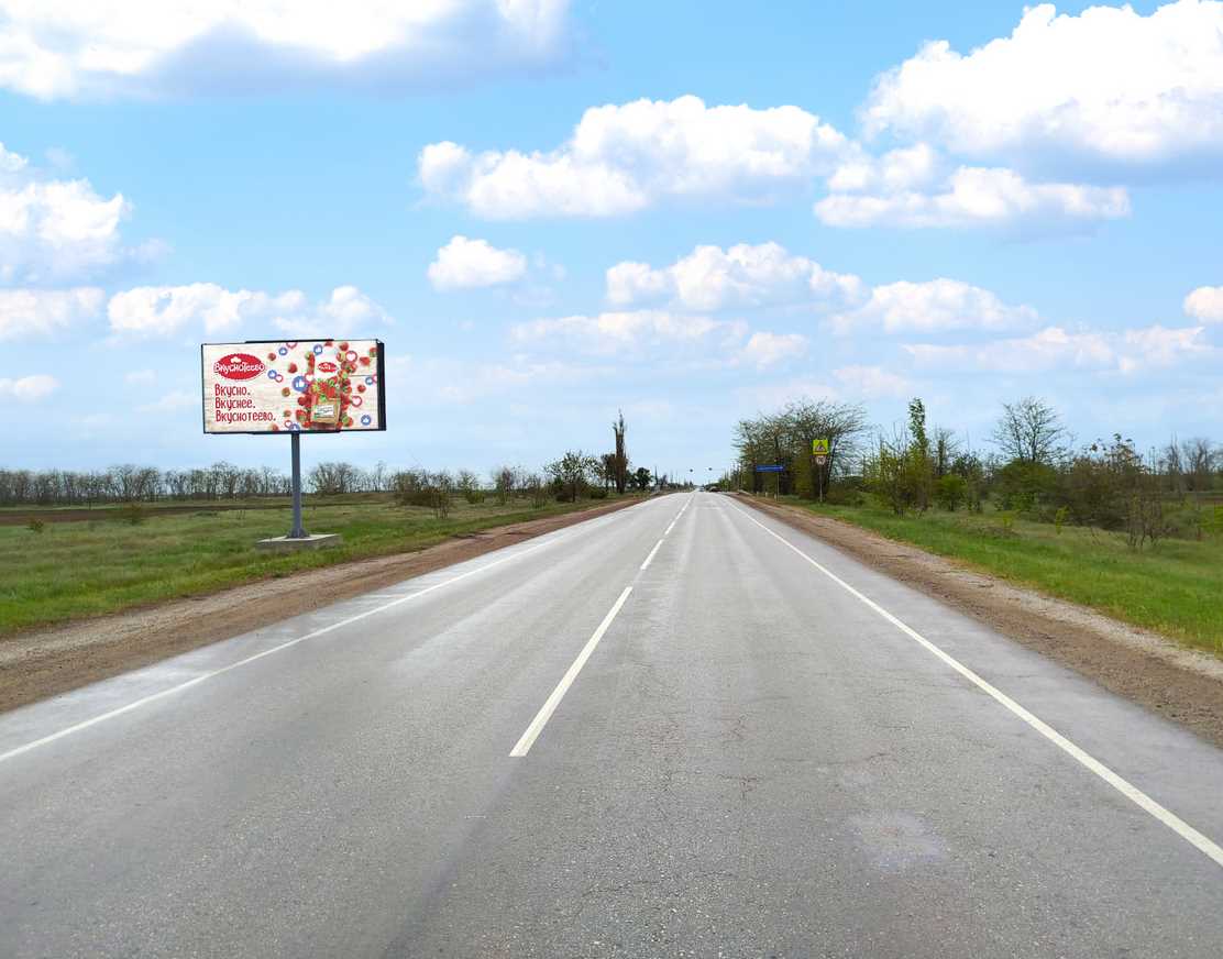 Фотография рекламного носителя, тип: Билборд 3x6, адрес: Кировское - Первомайское а/д, 8к 922м, Кировское, Донецкая область, Россия. Сторона B №1377030