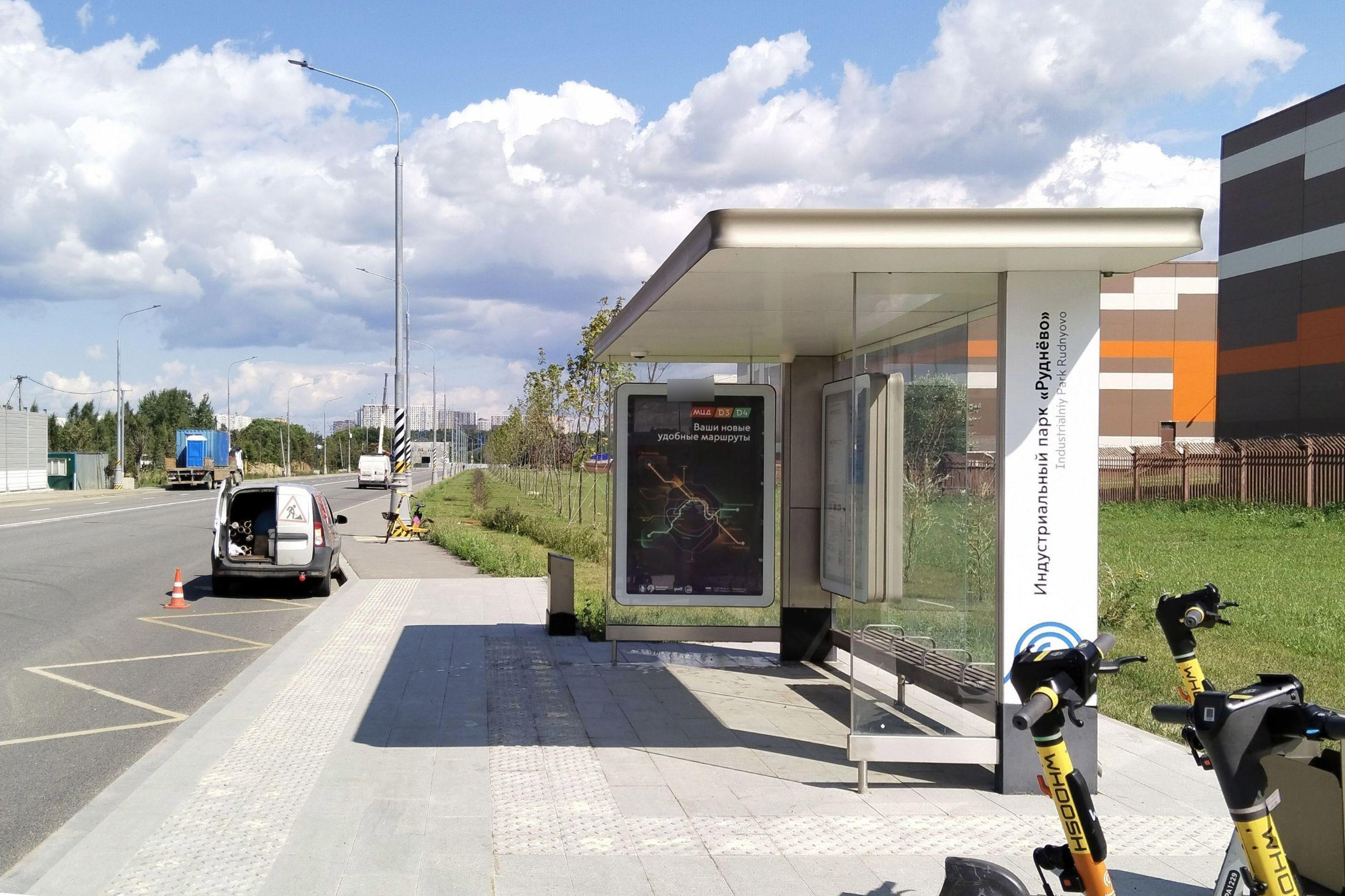 Фотография рекламного носителя, тип: Остановка 1.8x1.2, адрес: Проектируемый пр-зд. № 287, ост. Индустриальный парк "Руднево", поз.2, Москва, Россия. Сторона А №1066165