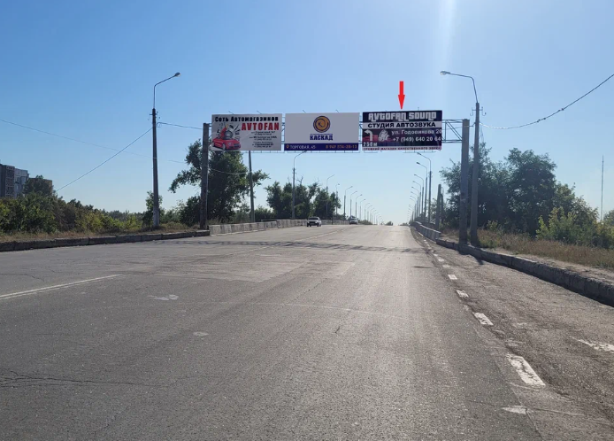 Фотография рекламного носителя, тип: Мультиборд, адрес: Петровского ул., перед мостом, Донецк, Донецкая область, Россия. Сторона А3 №1327436