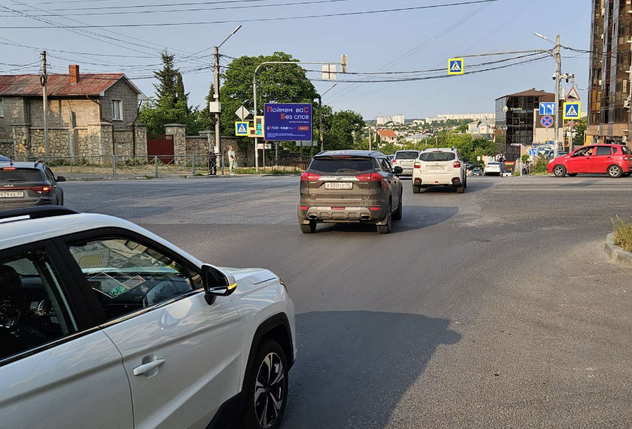 Фотография рекламного носителя, тип: Ситиборд 2.7x3.7, адрес: Олега Кошевого ул., д.23 X Николая Музыки ул., Севастополь, Россия. Сторона Б1-Б10 №824632