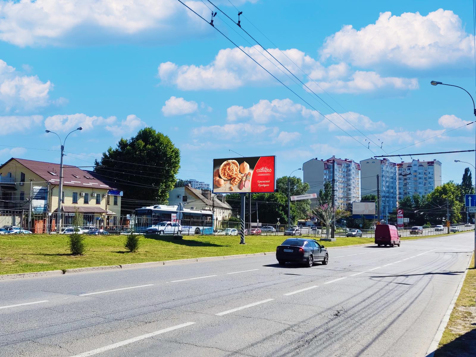 Фотография рекламного носителя, тип: Билборд 3x6, адрес: Победы пр-т., д.136 Х Титова ул., Симферополь, Республика Крым, Россия. Сторона A1-А10 №843724
