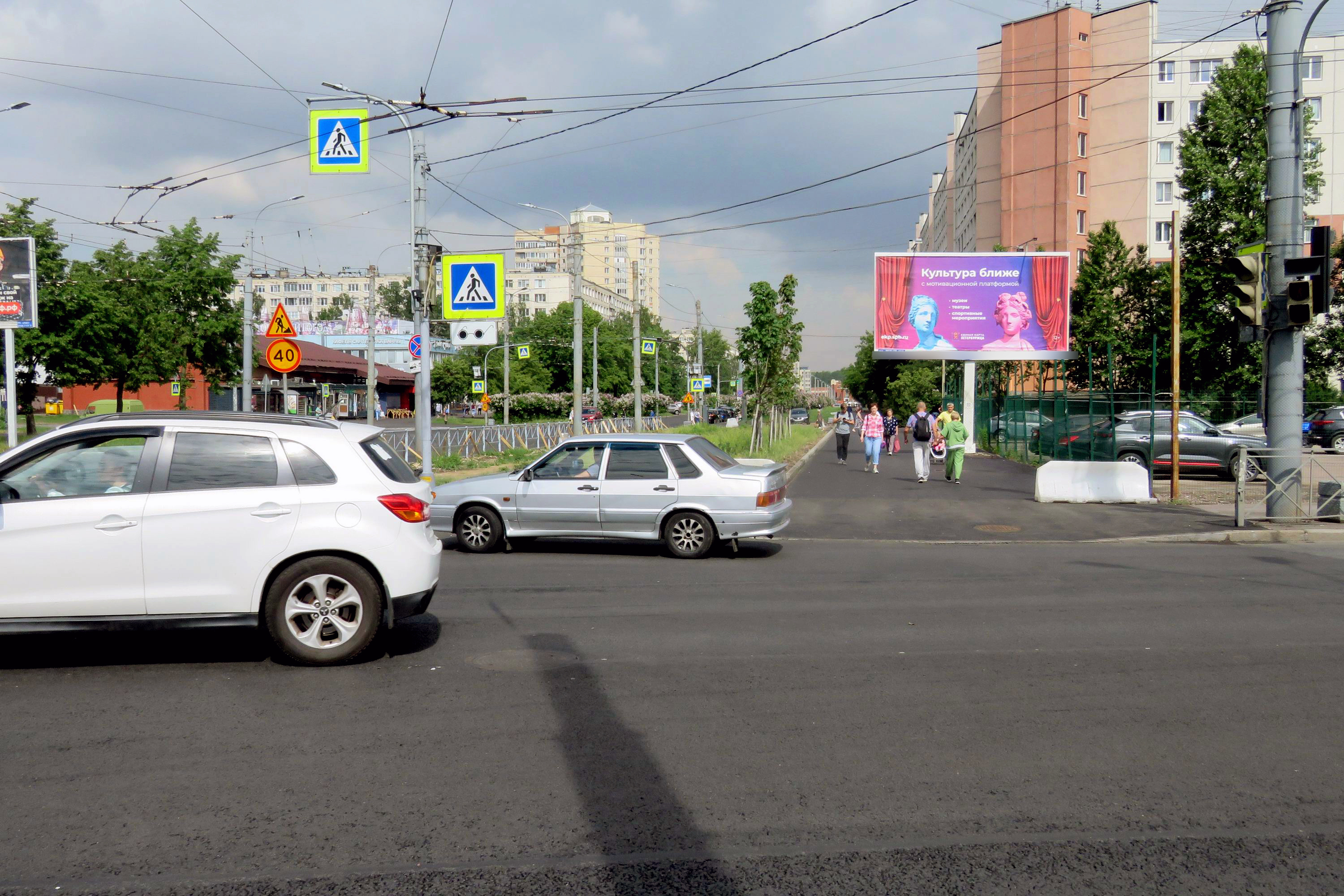 Фотография рекламного носителя, тип: Билборд 3x6, адрес: Будапештская ул., д.14, корп.1 Х Белы Куна ул., Санкт-Петербург, Россия. Сторона А1 №632039