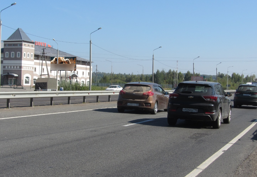 Фотография рекламного носителя, тип: Билборд 3x6, адрес: ФАД М7 а/д., 170 000 м, около ТЦ Золотые ворота, поз.4, Владимир, Владимирская область, Россия. Сторона Б №720162