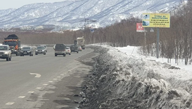 Фотография рекламного носителя, тип: Билборд 3x6, адрес: Петропавловск-Камчатский-морской порт-аэропорт а/д., 15 975м, Петропавловск-Камчатский, Камчатский край, Россия. Сторона А №1362421