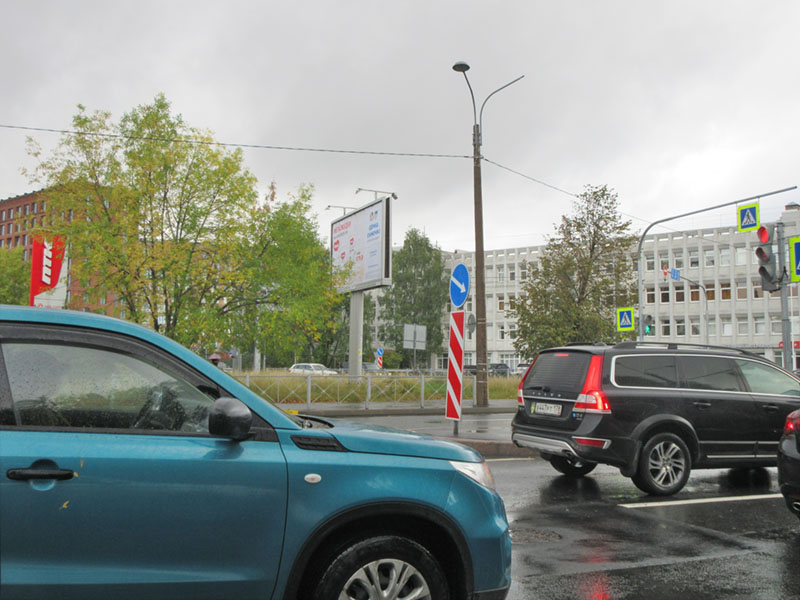 Фотография рекламного носителя, тип: Билборд 3x6, адрес: Уральская ул. Х КИМа пр-т., д.32, Санкт-Петербург, Россия. Сторона B №170141