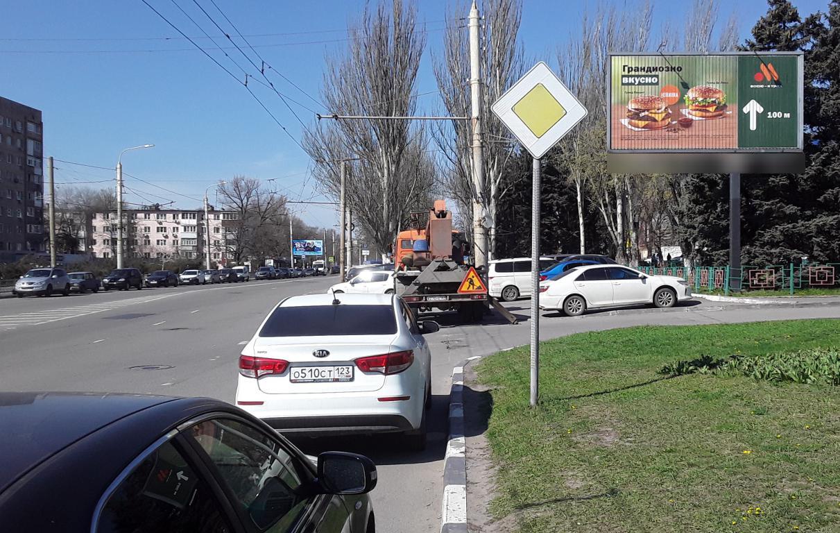 Фотография рекламного носителя, тип: Билборд 3x6, адрес: Коммунистический пр-т., д.30, Ростов-на-Дону, Ростовская область, Россия. Сторона A1-A3 №688785