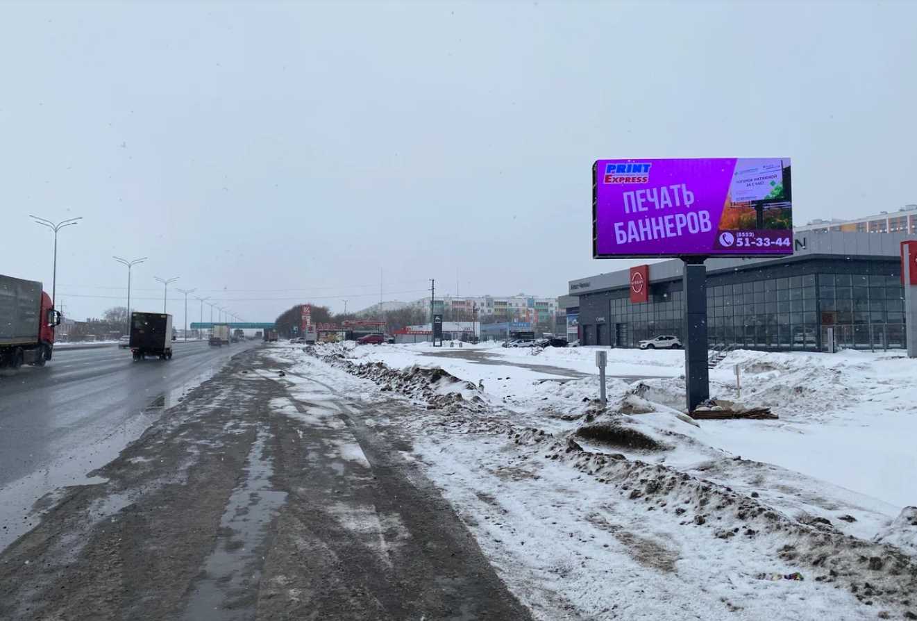 Фотография рекламного носителя, тип: Билборд 3x6, адрес: Казанский пр-т. Х Низаметдинова ул., в сторону поселка ГЭС, Набережные Челны, Республика Татарстан, Россия. Сторона A1-A10 №1013300