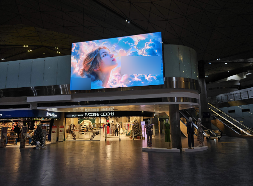 Фотография рекламного носителя, тип: Видеоэкран, адрес: Аэропорт «Пулково», Пулковское ш., д.41, Санкт-Петербург, Россия. Сторона/вариант №1404446