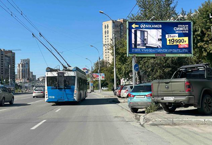 Фотография рекламного носителя, тип: Билборд 3x6, адрес: Кошурникова ул., д.29 Х Адриена Лежена ул., Новосибирск, Новосибирская область, Россия. Сторона А №194821