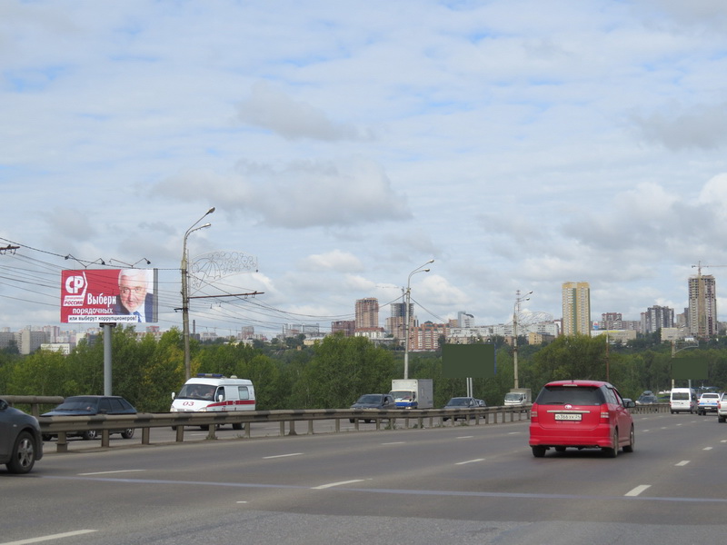 Фотография рекламного носителя, тип: Билборд 3x6, адрес: Октябрьский мост, спуск на пляж, Красноярск, Красноярский край, Россия. Сторона Б №88446