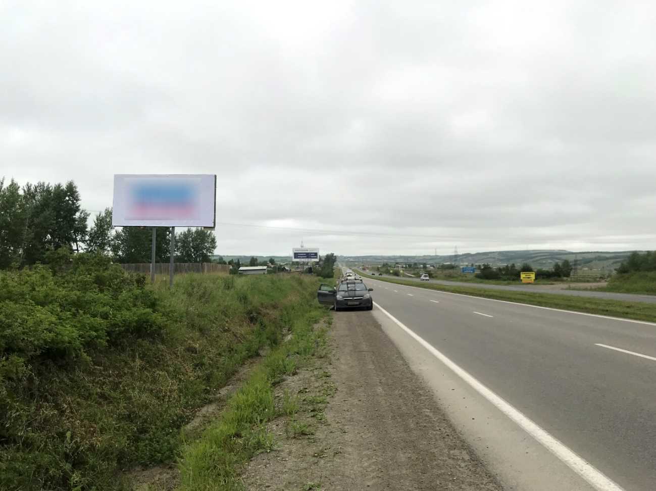 Фотография рекламного носителя, тип: Билборд 3x6, адрес: Енисейского тр-т., 11 200м, Красноярский край, Россия. Сторона Б №1361841