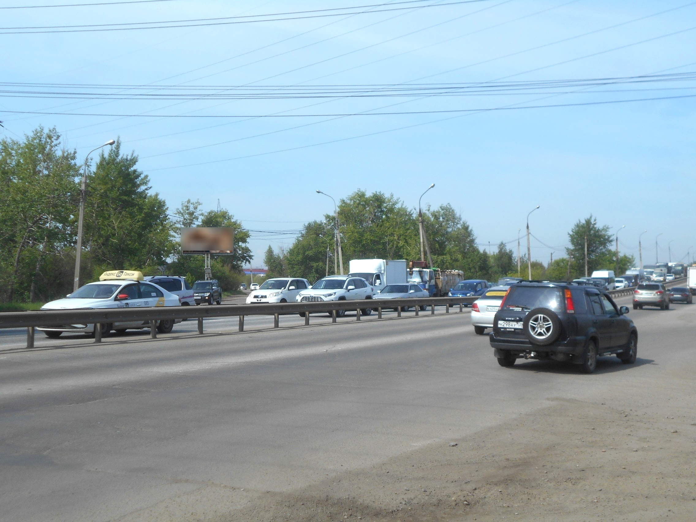 Фотография рекламного носителя, тип: Билборд 3x6, адрес: Трактовая ул., выезд О. Кошевого ул., Иркутск, Иркутская область, Россия. Сторона Б №1371428