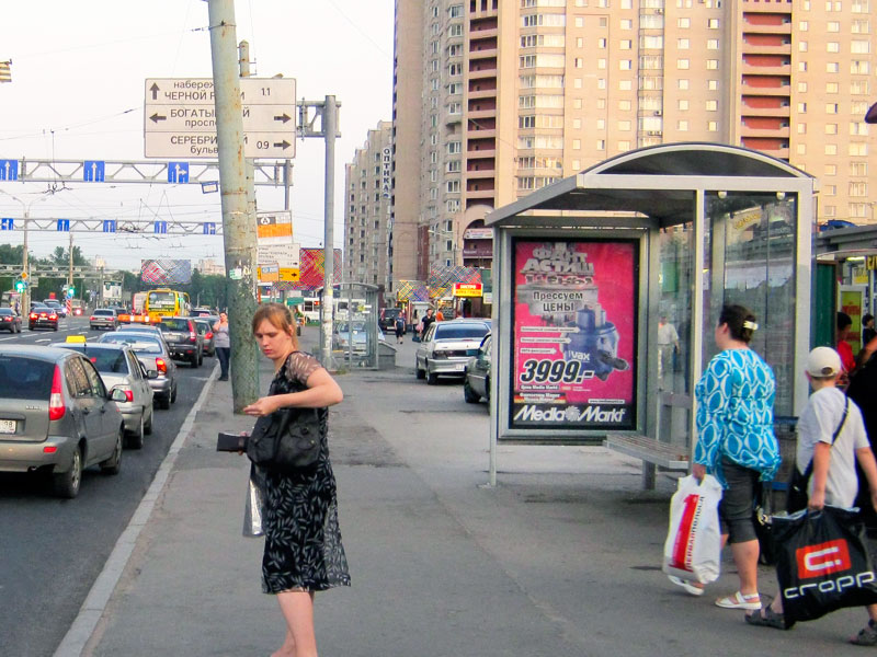 Фотография рекламного носителя, тип: Остановка 1.8x1.2, адрес: Коломяжский пр-т., д.24, ост. ст.м. Пионерская, поз.2, Санкт-Петербург, Россия. Сторона А №165609