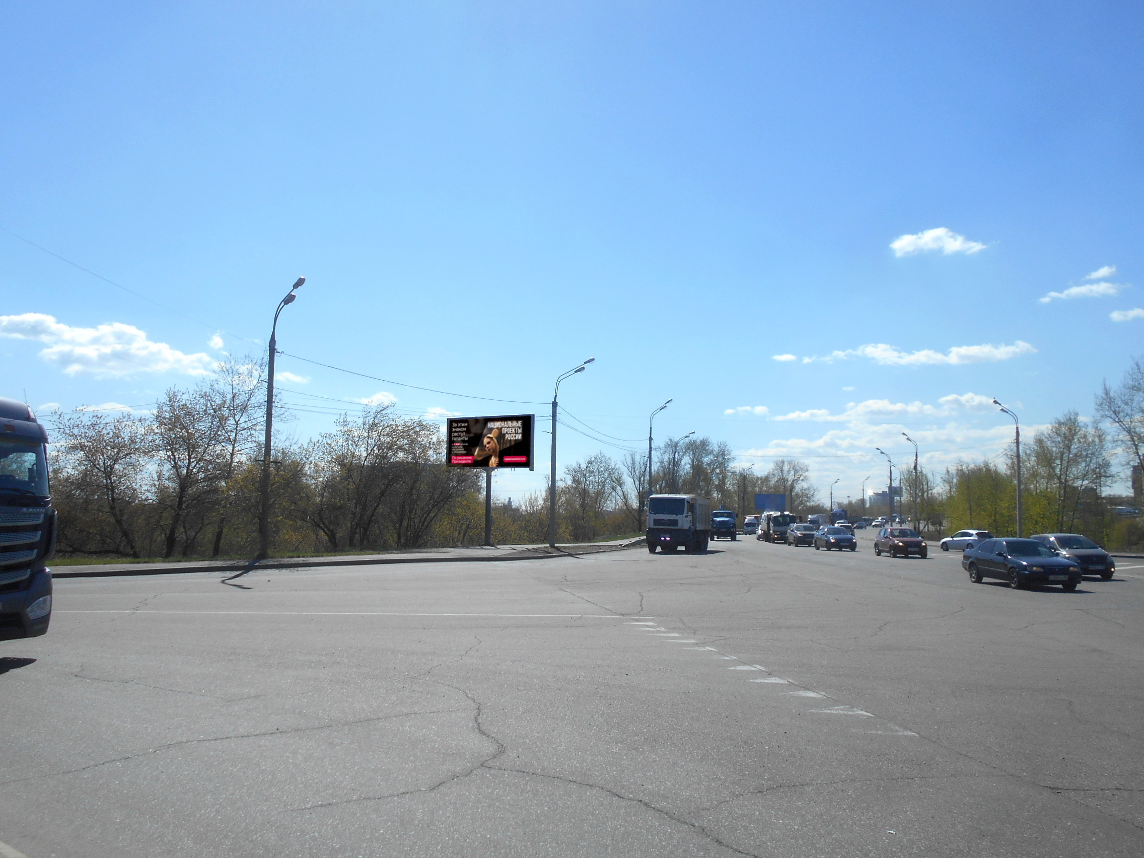 Фотография рекламного носителя, тип: Билборд 3x6, адрес: Трактовая ул., Иркутский мост, развязка, Иркутск, Иркутская область, Россия. Сторона Б №1371429