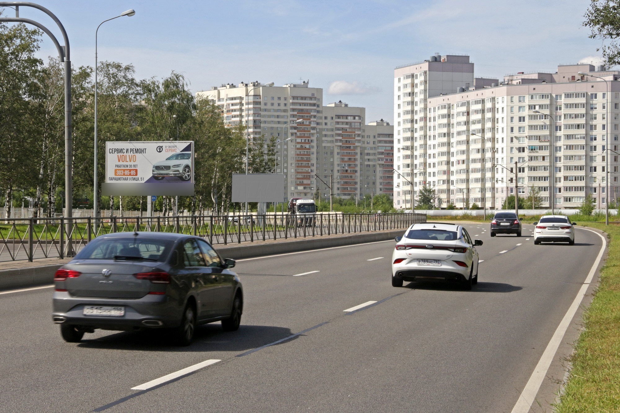 Фотография рекламного носителя, тип: Билборд 3x6, адрес: Приморское ш. X Школьная ул., д.71, корп.1, Санкт-Петербург, Россия. Сторона Б №153560