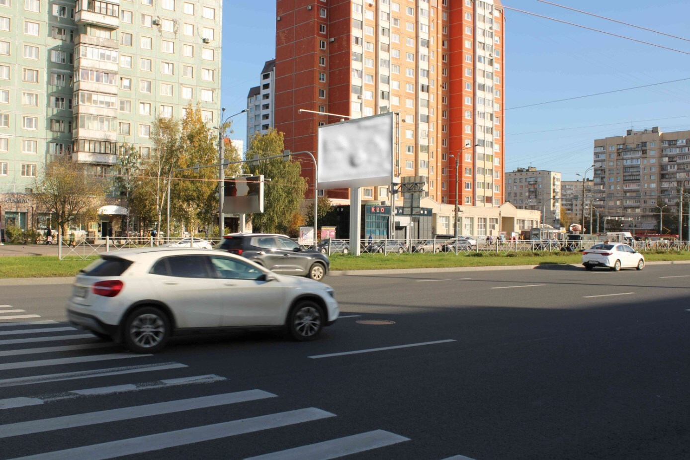 Фотография рекламного носителя, тип: Билборд 3x6, адрес: Просвещения пр-т., д.32, корп.1, Санкт-Петербург, Россия. Сторона Б №120566